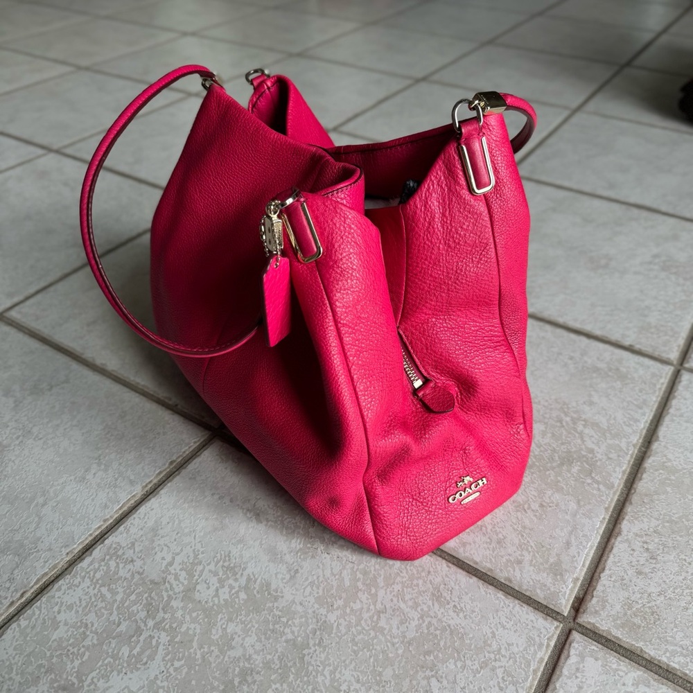 Coach Pink Hobo Bag with Slouchy Design